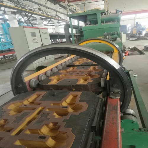 Iron mold sand - coated crankshaft casting line